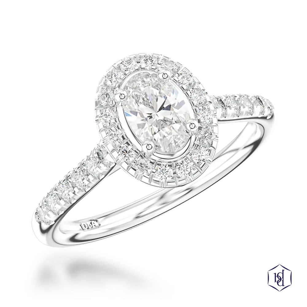 oval cut diamond in a platinum cluster diamond band