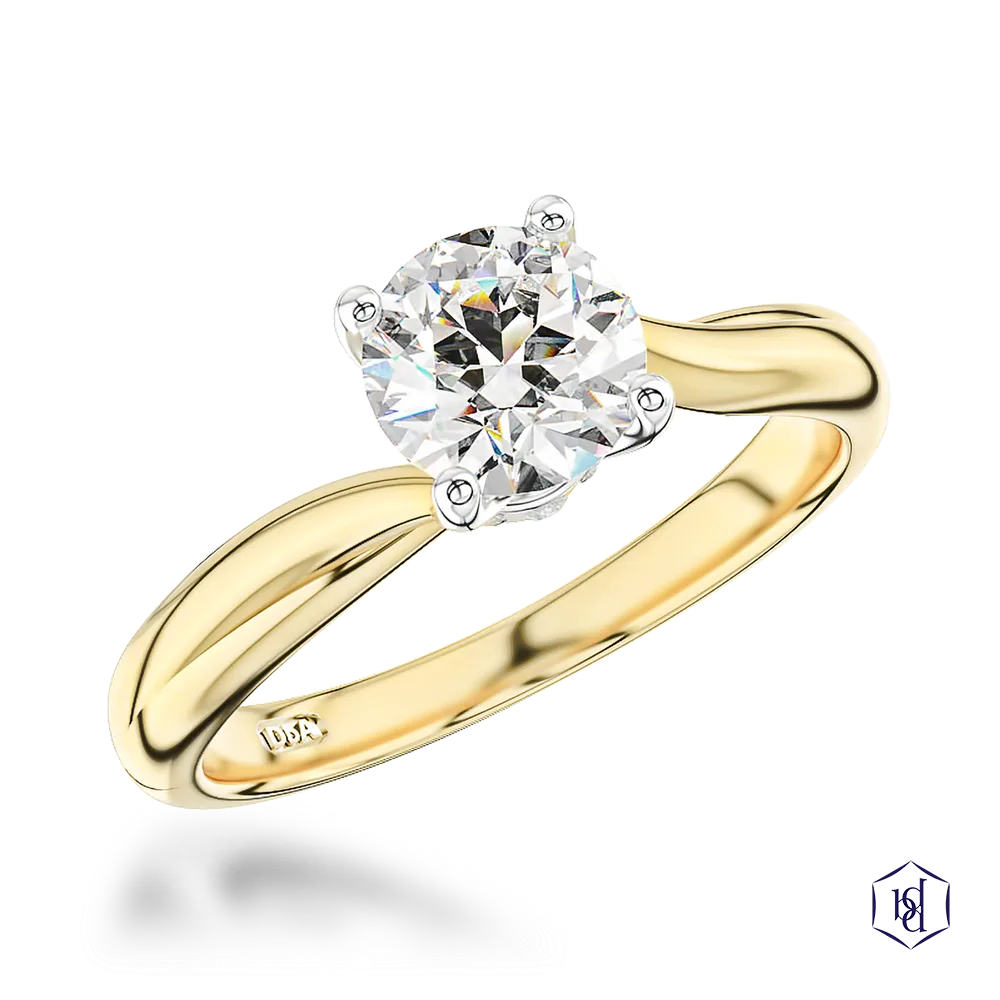 round brilliant cut diamond in a 18ct yellow gold shank and platinum head solitaire plain band