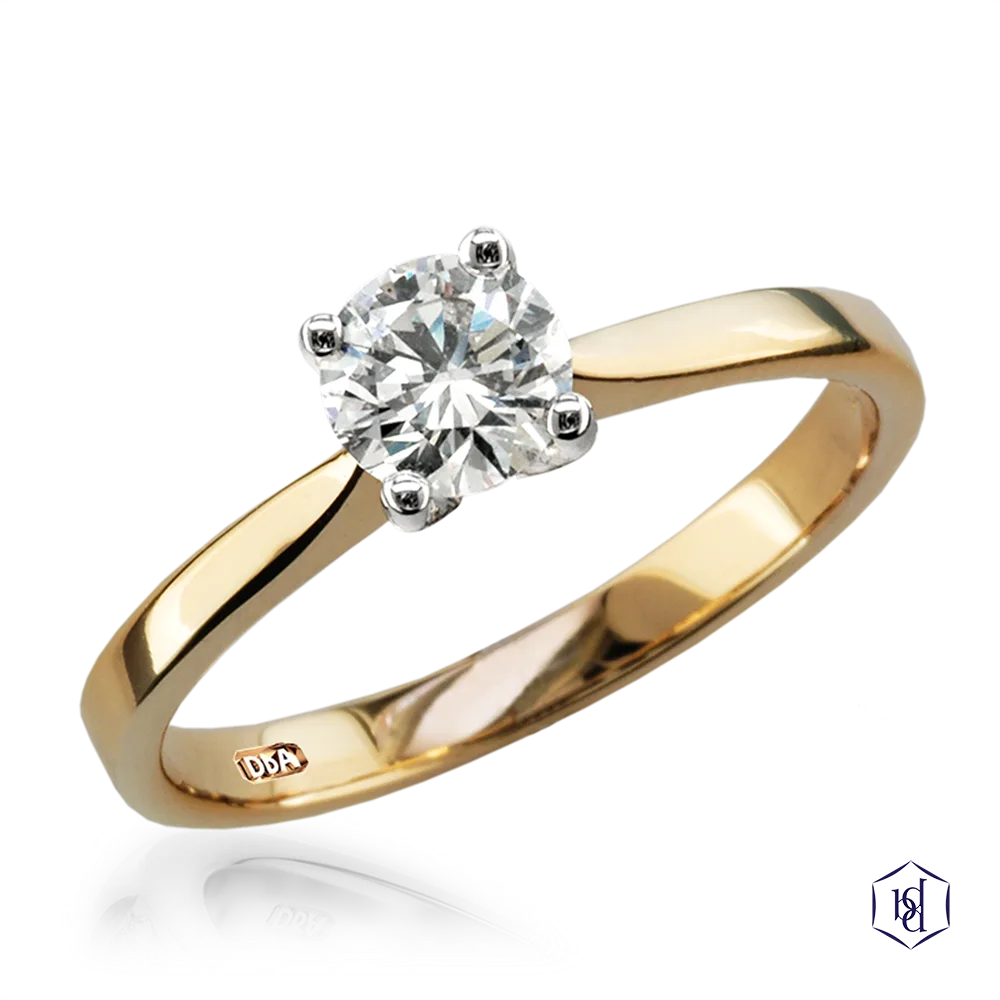 round brilliant cut diamond in a 18ct yellow gold shank and platinum head solitaire plain band