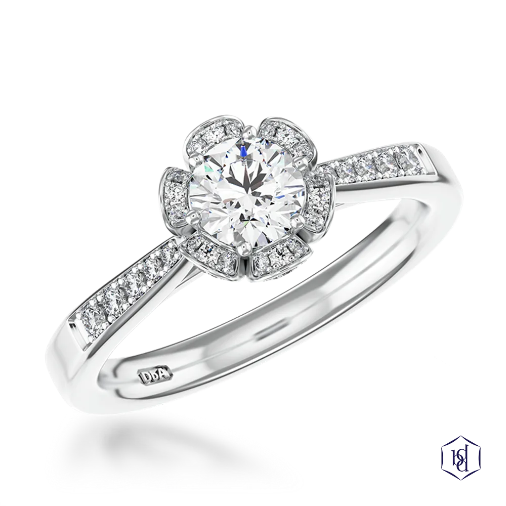 round brilliant cut diamond in a platinum cluster diamond band