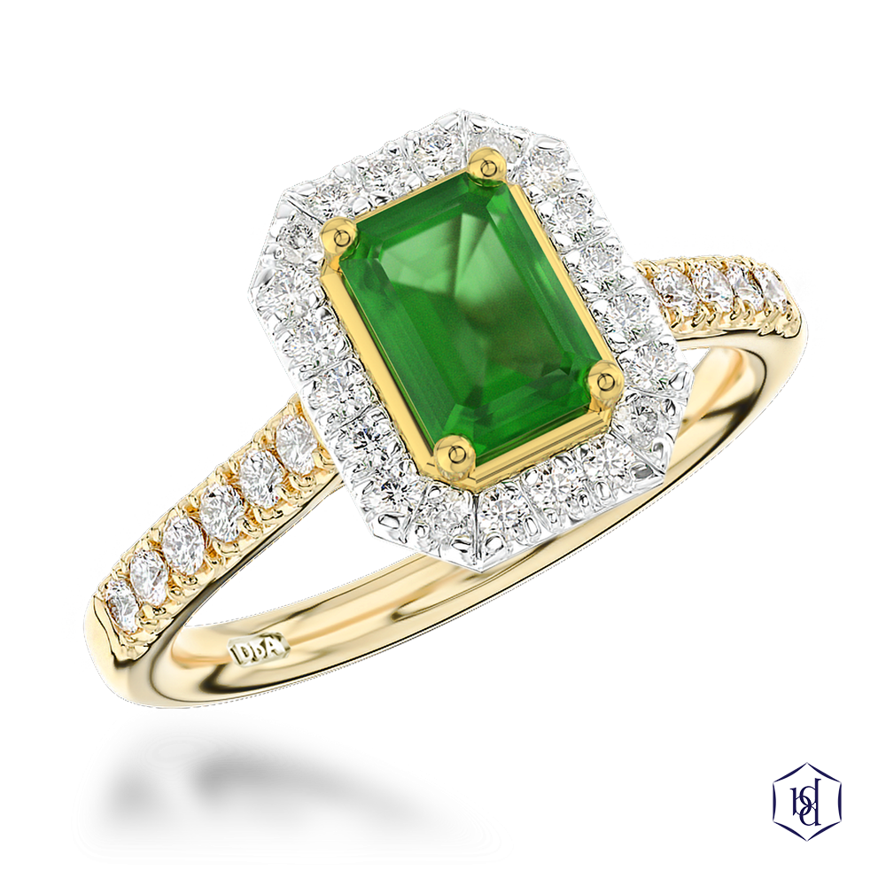 emerald cut emerald in a 18ct yellow gold shank and platinum head cluster diamond band