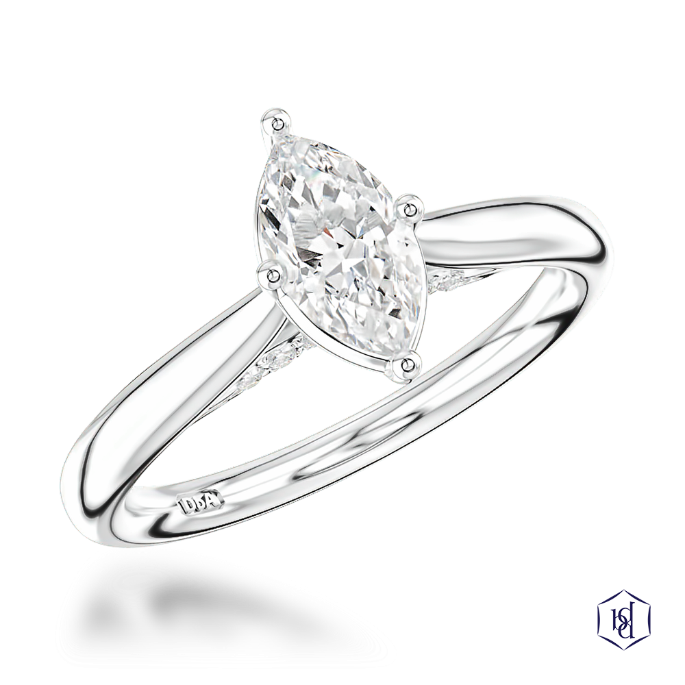 marquise cut diamond in a platinum solitaire plain band
