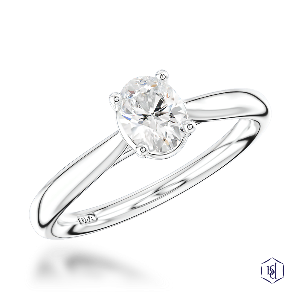 oval cut diamond in a platinum solitaire plain band