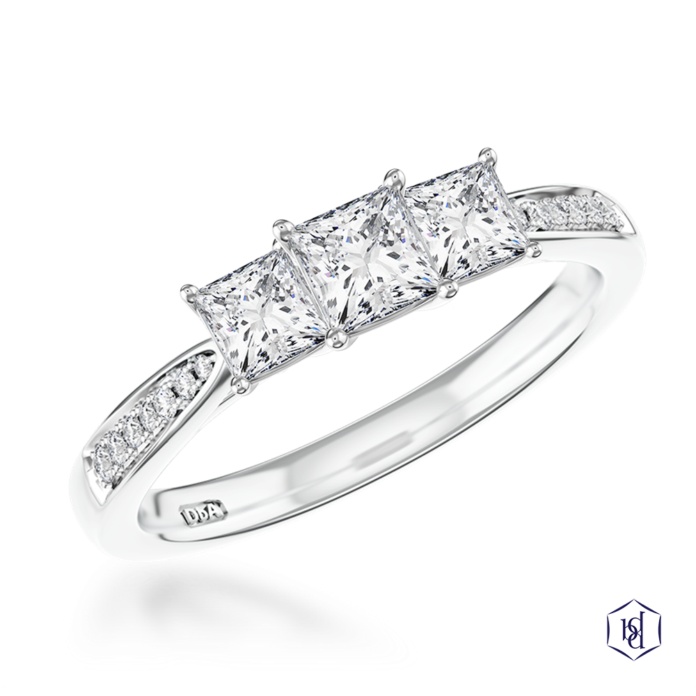 princess cut diamond in a platinum three stone diamond band