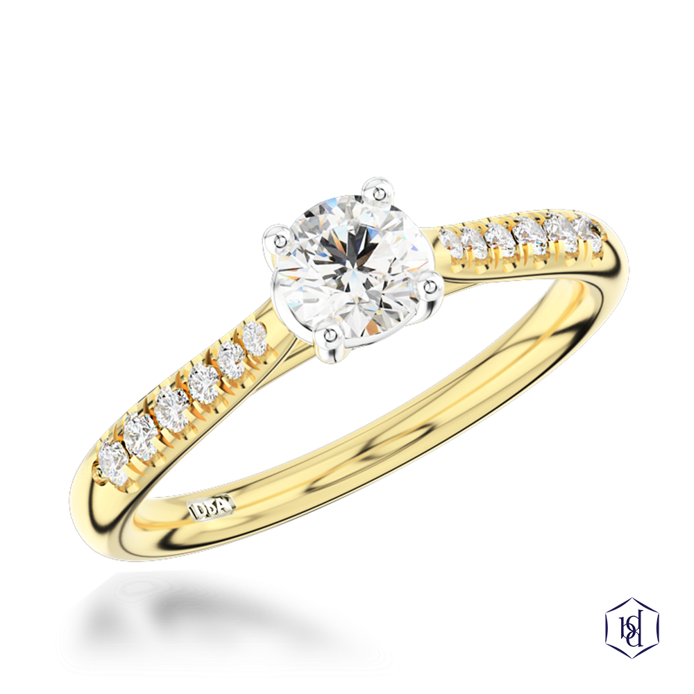 round brilliant cut diamond in a 18ct yellow gold shank and platinum head solitaire diamond band