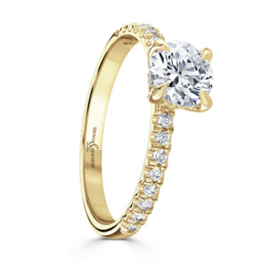 Lab Created 18ct yellow gold diamond solitaire ring with diamond set shoulders